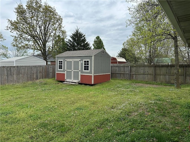 view of shed featuring a fenced backyard