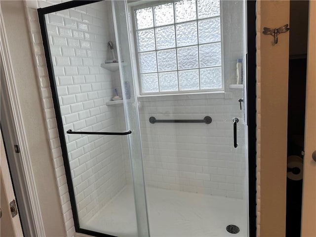 full bathroom featuring a stall shower