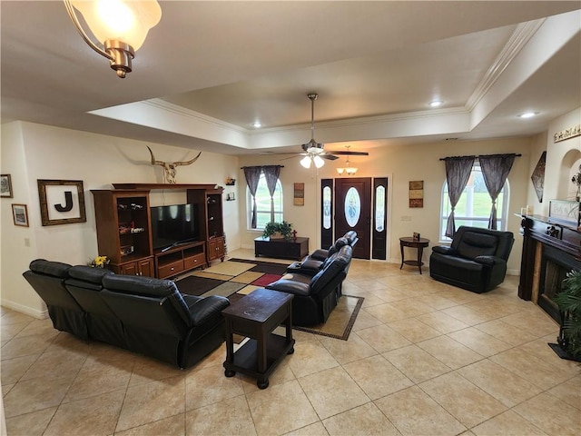 21854 S Floyd Moore Rd, Gentry, AR 72734 - living area featuring a raised ceiling, crown molding, light tile patterned floors, healthy amount of natural light, and recessed lighting