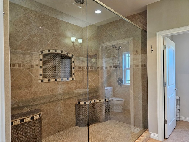 bathroom with visible vents, recessed lighting, a walk in shower, and toilet