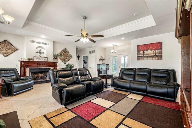 21854 S Floyd Moore Rd, Gentry, AR 72734 - living room featuring a raised ceiling, light tile patterned flooring, ceiling fan, a fireplace, and recessed lighting