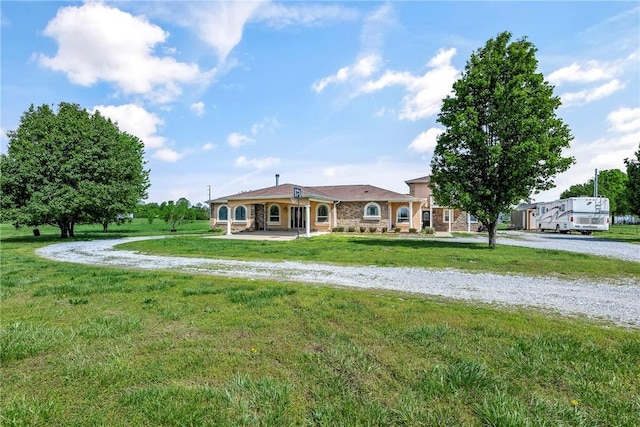 21854 S Floyd Moore Rd, Gentry, AR 72734 - rear view of house featuring a lawn and curved driveway