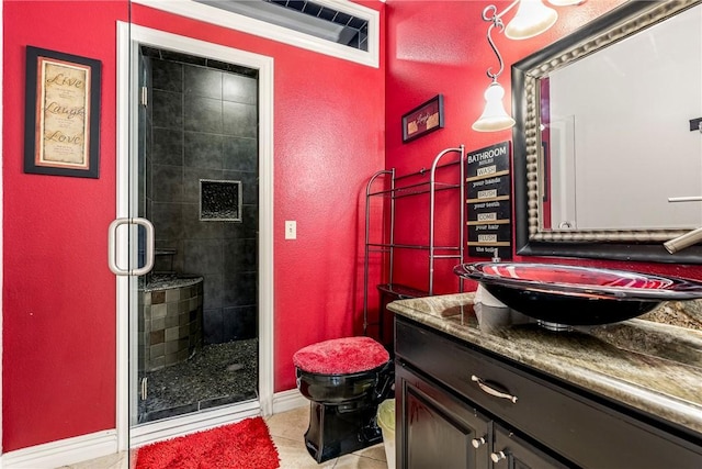 21854 S Floyd Moore Rd, Gentry, AR 72734 - bathroom with a textured wall, a shower stall, baseboards, tile patterned floors, and vanity