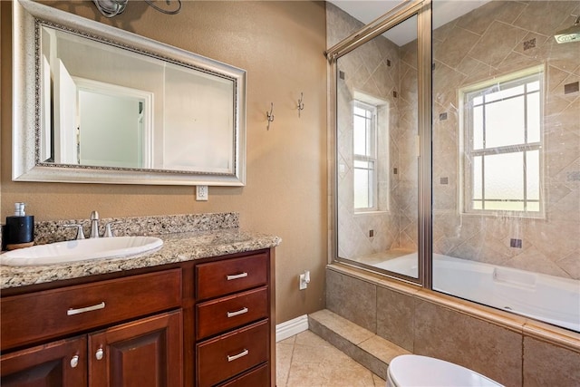 21854 S Floyd Moore Rd, Gentry, AR 72734 - bathroom with tiled shower / bath combo, tile patterned floors, vanity, toilet, and baseboards