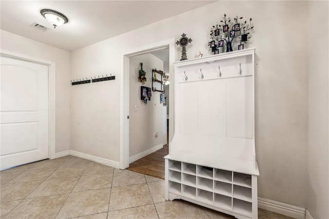 21854 S Floyd Moore Rd, Gentry, AR 72734 - mudroom with light tile patterned floors and baseboards
