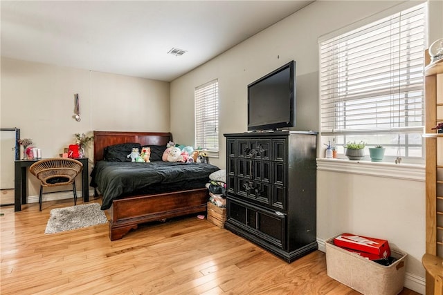 21854 S Floyd Moore Rd, Gentry, AR 72734 - bedroom with wood finished floors