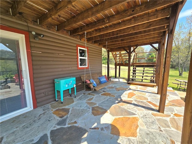 view of patio / terrace with stairway