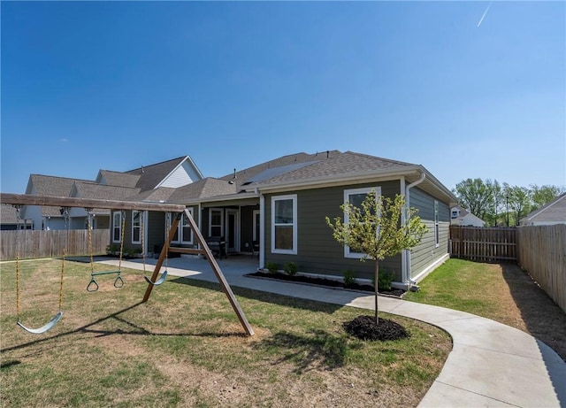 rear view of house featuring a patio