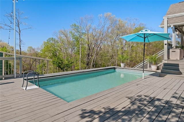 pool featuring a wooden deck