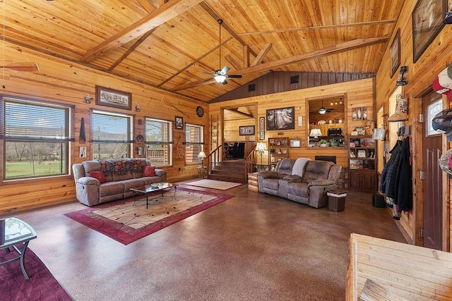 living room featuring wood ceiling, lofted ceiling with beams, wooden walls, and a ceiling fan