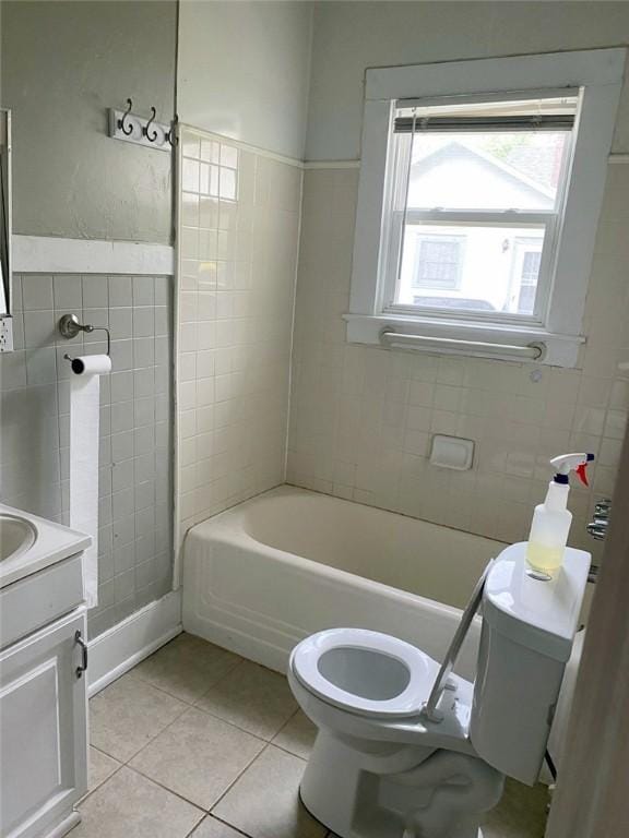 bathroom with tile patterned floors, vanity, and toilet