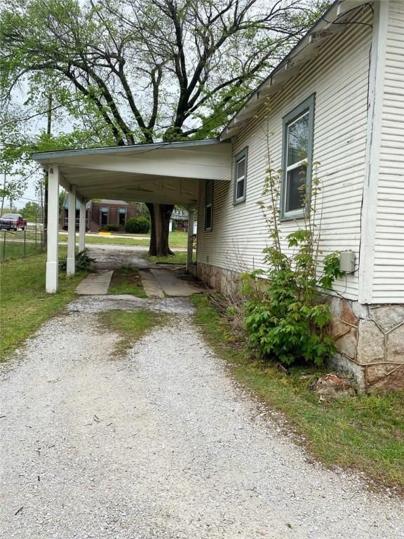 exterior space featuring driveway and a carport