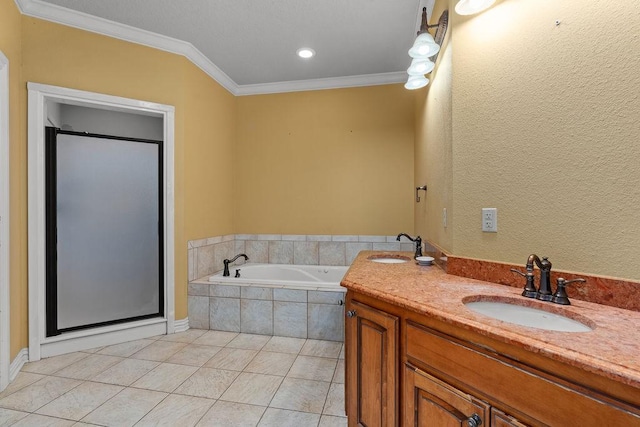 full bath featuring a bath, crown molding, a sink, and tile patterned floors