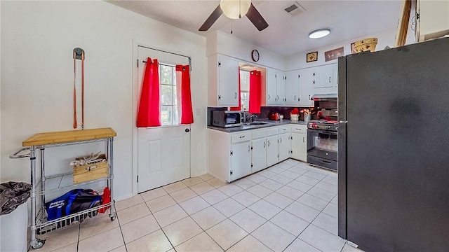 kitchen with a ceiling fan, visible vents, white cabinetry, black appliances, and light tile patterned flooring