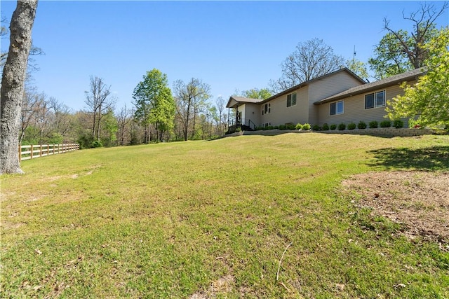 view of yard featuring fence