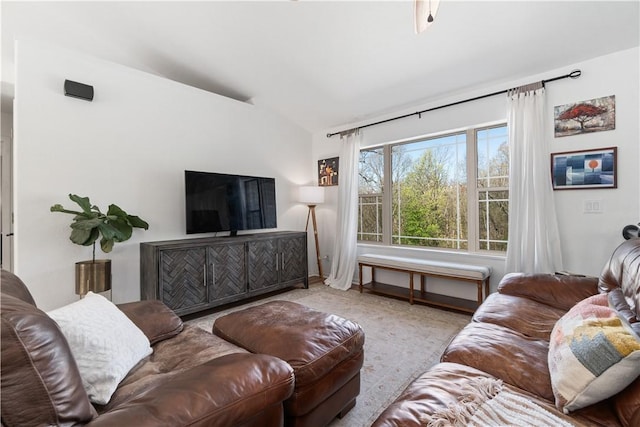 living area with vaulted ceiling