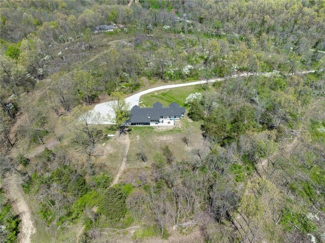 bird's eye view featuring a view of trees