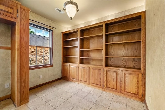 511 N Oakwood St, Lowell, AR 72745 - interior space featuring visible vents, baseboards, and light tile patterned floors