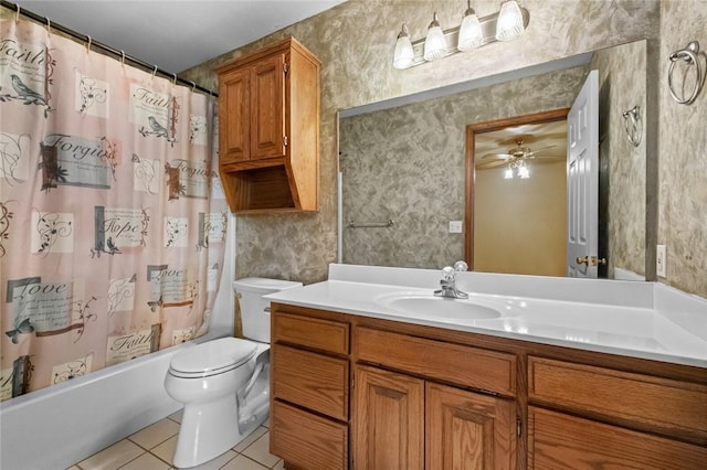 511 N Oakwood St, Lowell, AR 72745 - bathroom featuring a ceiling fan, tile patterned flooring, shower / bath combo, vanity, and toilet