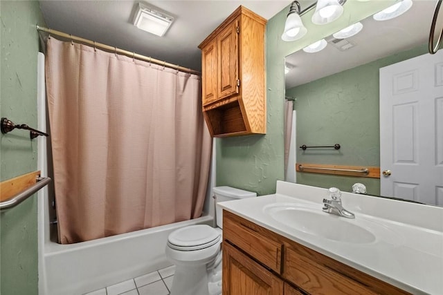 511 N Oakwood St, Lowell, AR 72745 - bathroom with visible vents, tile patterned flooring, vanity, toilet, and shower / bath combo with shower curtain