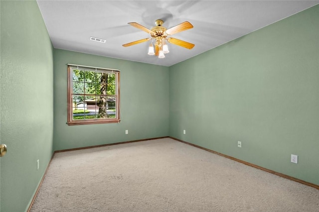 511 N Oakwood St, Lowell, AR 72745 - empty room with carpet floors, baseboards, ceiling fan, and visible vents