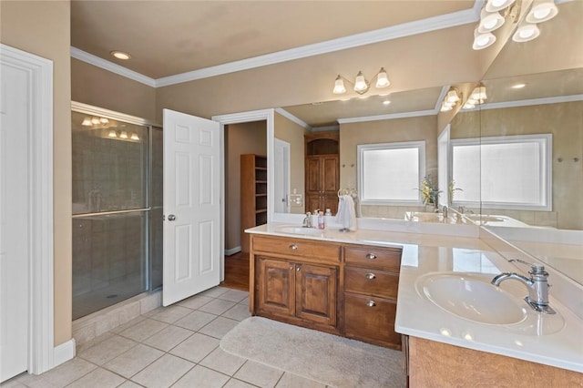 bathroom with tile patterned floors, a stall shower, and a sink