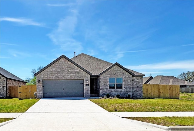 ranch-style house featuring fence, concrete driveway, a front lawn, and a garage
