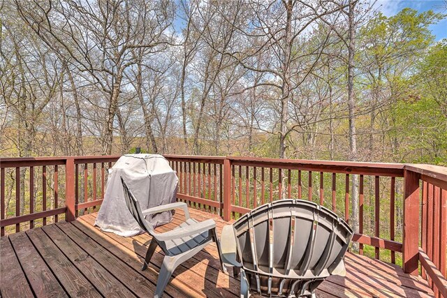 deck featuring a fire pit