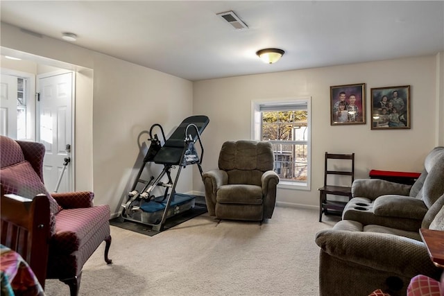 living area with baseboards, carpet flooring, and visible vents