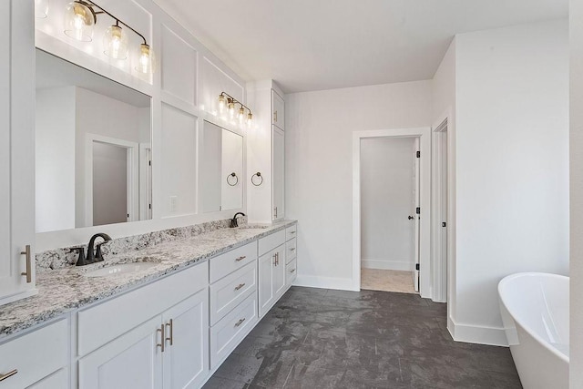 6416 S 59th St, Rogers, AR 72758 - bathroom featuring double vanity and a freestanding bath