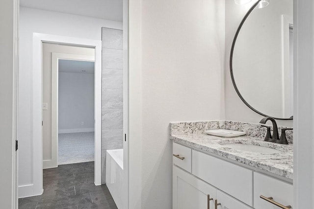 6416 S 59th St, Rogers, AR 72758 - bathroom featuring vanity and a tub to relax in