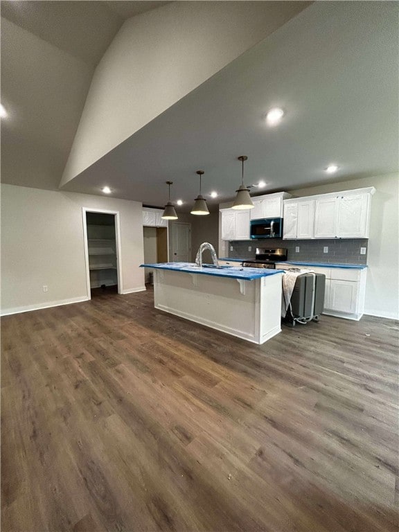 34 Brierfield Ln, Bella Vista, AR 72714 - kitchen with range, recessed lighting, white cabinets, backsplash, and dark wood finished floors