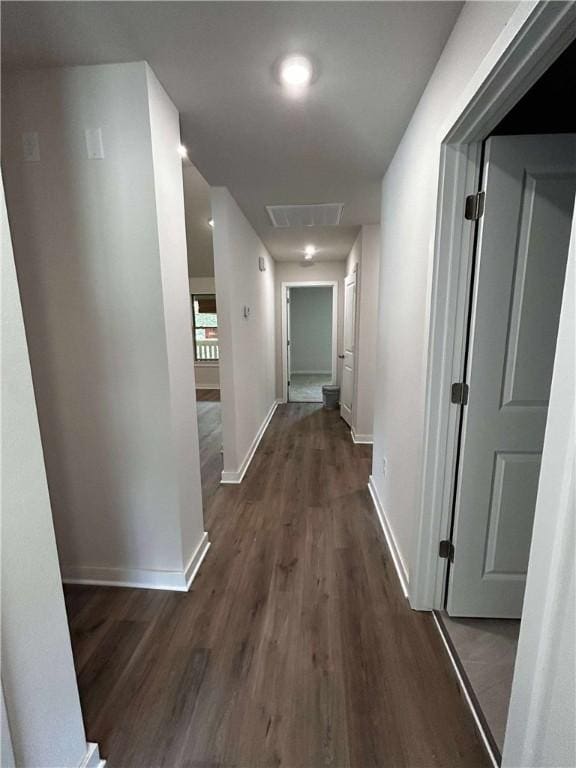 34 Brierfield Ln, Bella Vista, AR 72714 - hallway featuring wood finished floors and baseboards