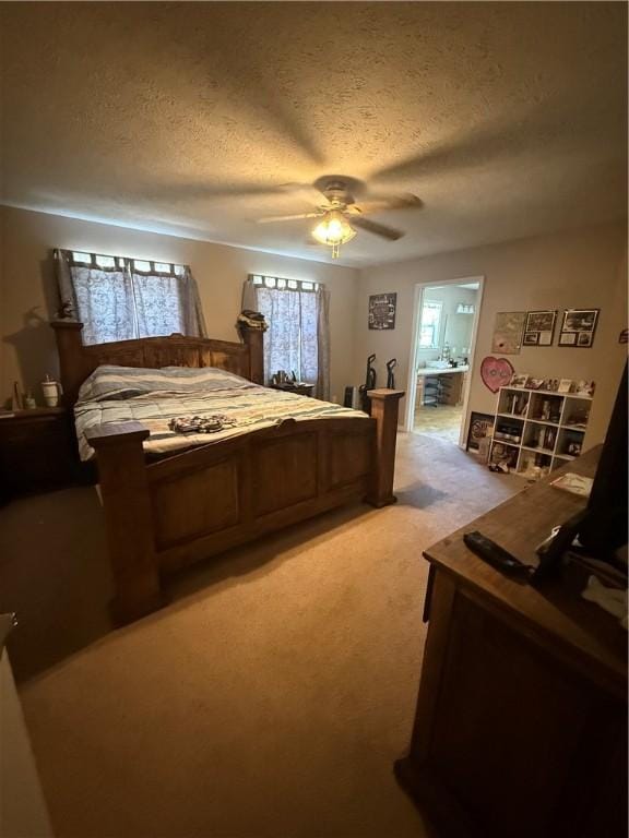 1306 Sunset Blvd, Berryville, AR 72616 - bedroom with a textured ceiling, light colored carpet, and ceiling fan