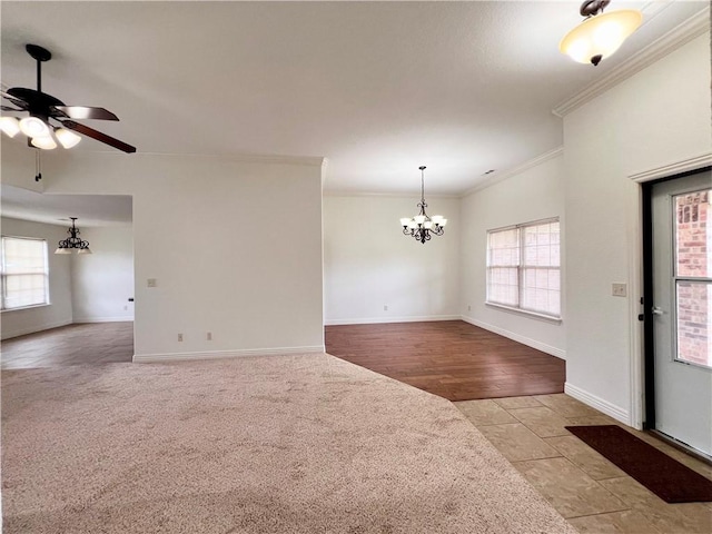 1650 Affirmed Ln, Prairie Grove, AR 72753 - empty room with a chandelier, crown molding, healthy amount of natural light, and a ceiling fan