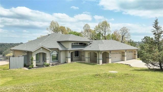 view of front of house with a garage, fence, stucco siding, a shingled roof, and concrete driveway