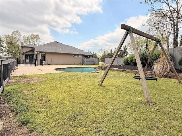 view of pool featuring a fenced in pool, a fenced backyard, and a yard