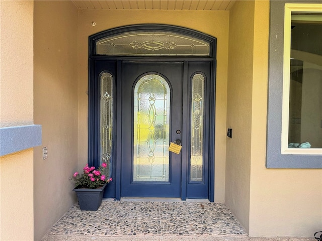 14689 Frisco Springs Rd, Lowell, AR 72745 - doorway to property with stucco siding