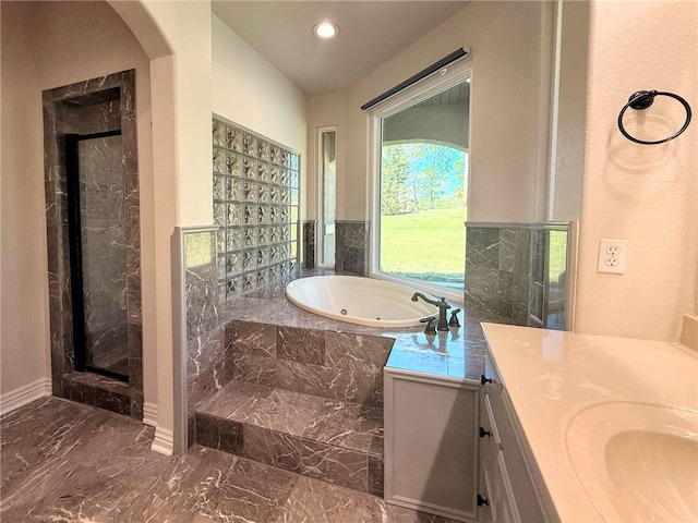 14689 Frisco Springs Rd, Lowell, AR 72745 - full bath featuring marble tiled floors, a stall shower, a tub with jets, vanity, and recessed lighting