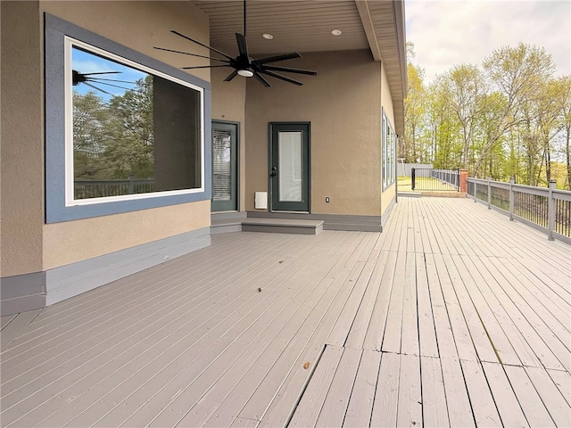 wooden deck with ceiling fan
