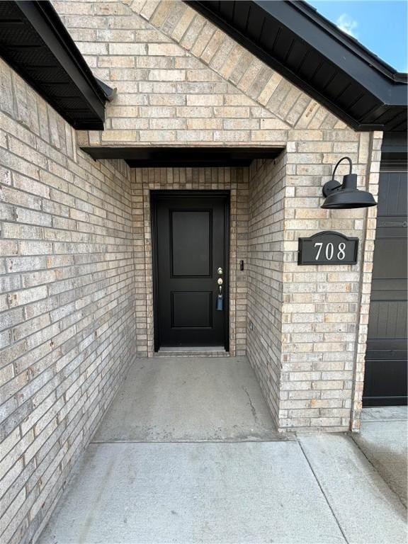 708 W Taylor St, Siloam Springs, AR 72761 - entrance to property featuring brick siding