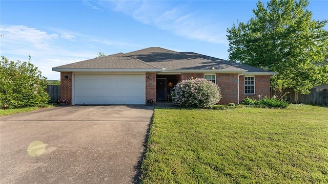 single story home featuring a front lawn, concrete driveway, fence, a garage, and brick siding