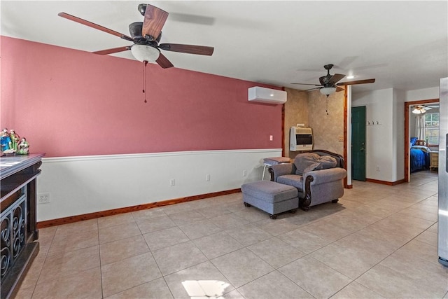 living room with a wall mounted AC, ceiling fan, heating unit, and light tile patterned floors