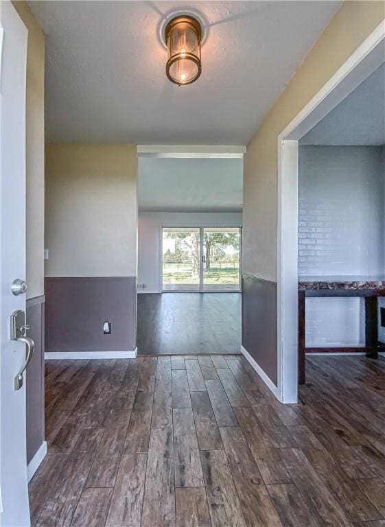 4802 Greenbriar Ln, Everton, AR 72633 - empty room with baseboards and dark wood finished floors