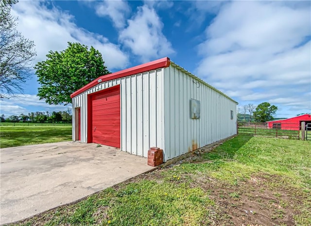4802 Greenbriar Ln, Everton, AR 72633 - detached garage featuring fence and driveway