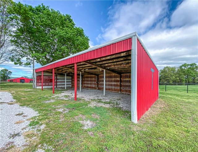 4802 Greenbriar Ln, Everton, AR 72633 - view of pole building with fence and a yard