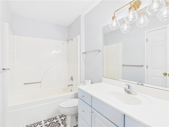 full bath with tile patterned floors, vanity, bathtub / shower combination, and toilet
