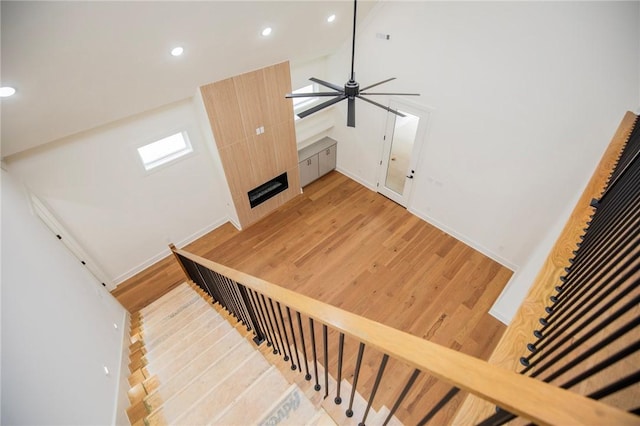 4708 Fieldcrest Ter, Rogers, AR 72758 - stairway featuring wood finished floors, recessed lighting, and ceiling fan