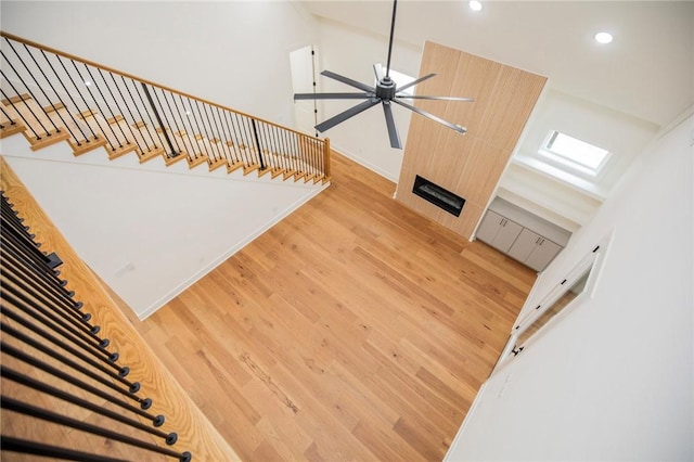 4708 Fieldcrest Ter, Rogers, AR 72758 - stairway with recessed lighting, ceiling fan, and wood finished floors