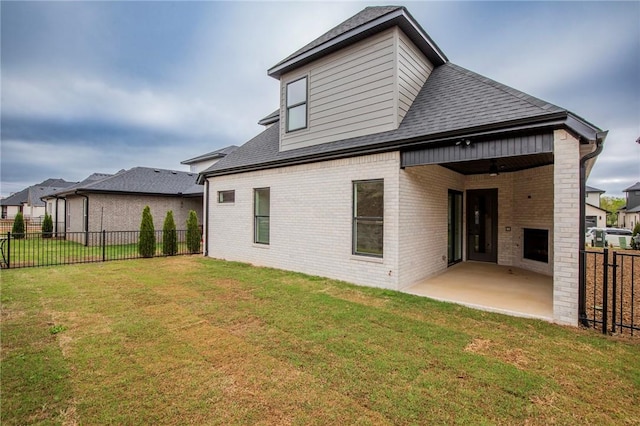 4708 Fieldcrest Ter, Rogers, AR 72758 - back of house with brick siding, a patio, a fenced backyard, roof with shingles, and a ceiling fan